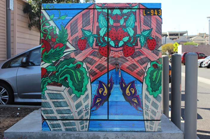 A power box with rooftop gardens painted on it.
