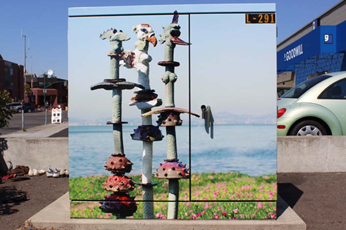 A power box with the image of are on a cliff on it.